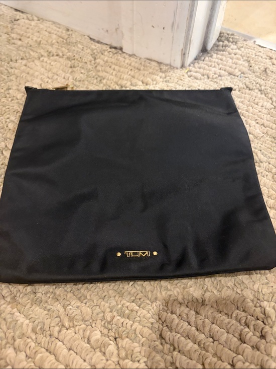 Tumi Handbags - Tumi Black Nylon Clutch with Gold Accent